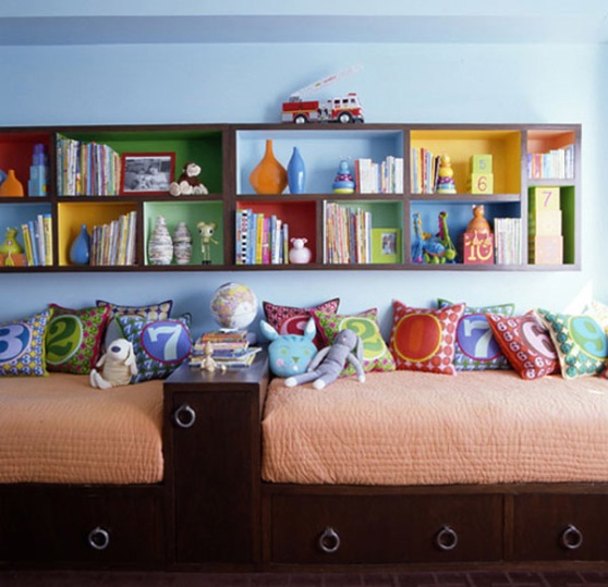 sofa-with-colorful-cushions-and-wall-bookcase